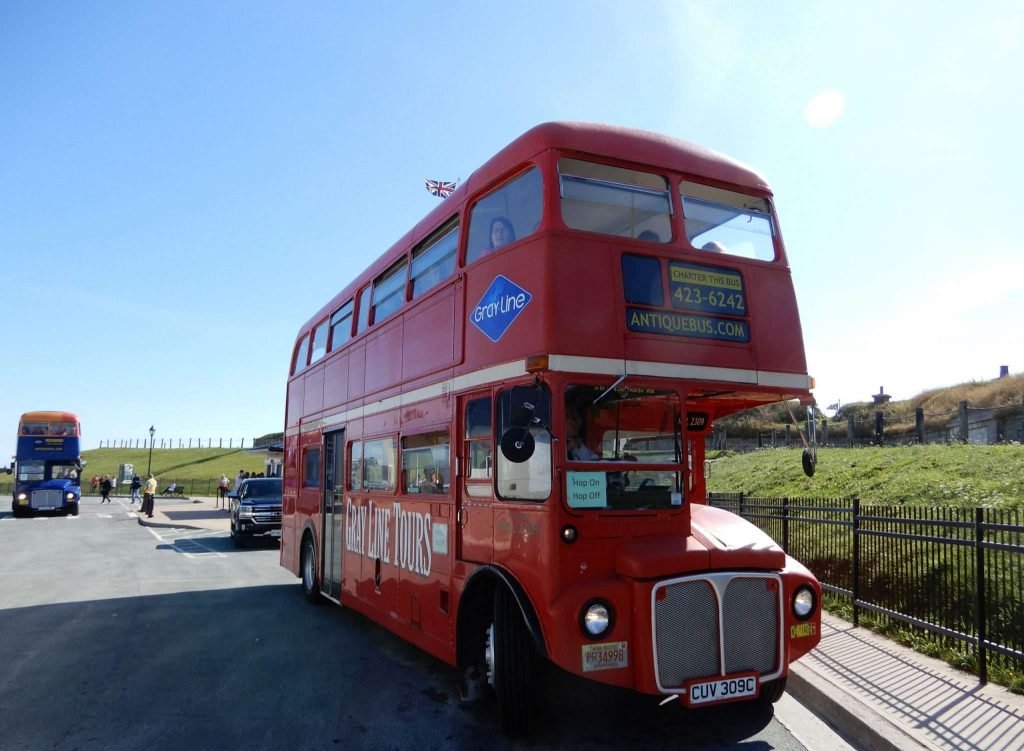 A Gray Line tour bus offering hop-on, hop-off sightseeing tours in Halifax, Canada.