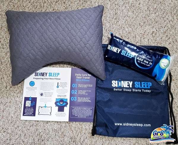 A mini hypoallergenic travel pillow, designed to provide comfort while traveling without allergies.