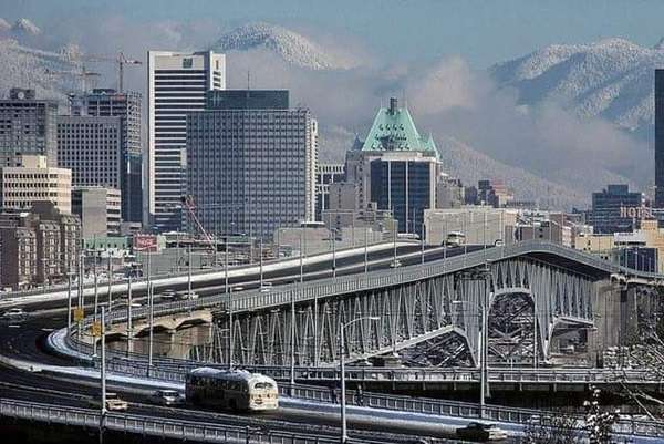A nostalgic photo showcasing the city of Vancouver, highlighting its urban landscape and culture.