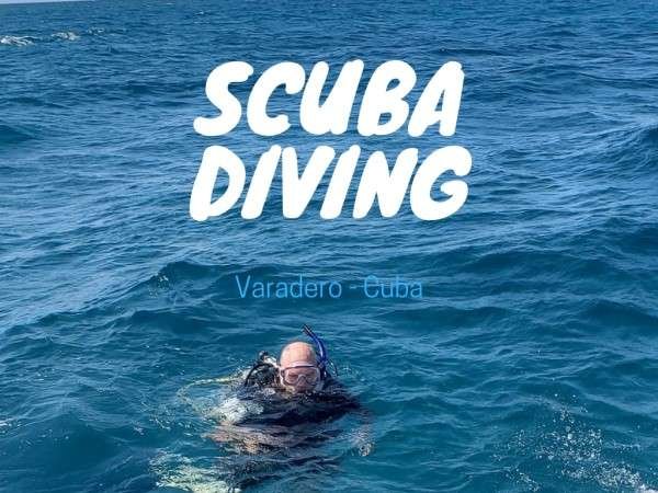 Scuba diving in Varadero, Cuba, showcasing colorful coral reefs and diverse marine life.