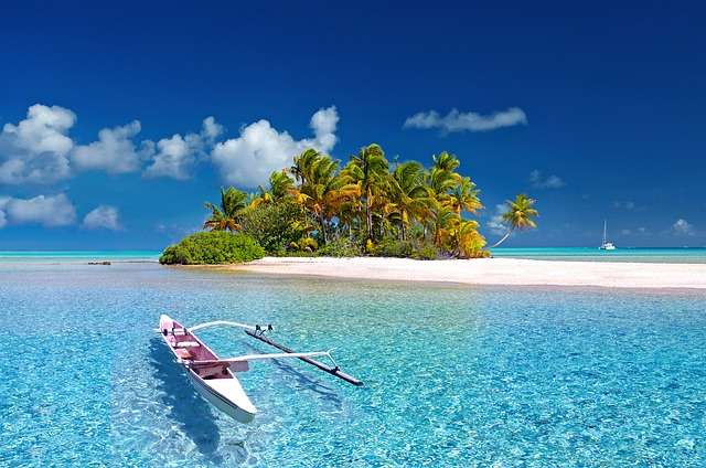 A vibrant image of Polynesia, showcasing its tropical islands, culture, and stunning beaches.